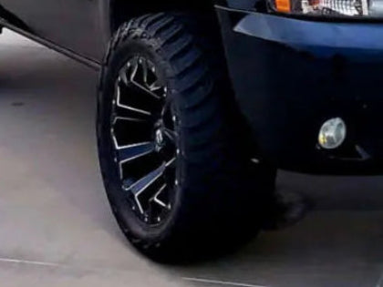 Mounted & Balanced Package - Fuel Assault D576 Wheel - 6x135/6x139.7 Bolt Pattern - (Gloss Black Milled Finish) - Mud Terrain Attack MT A Tire  - 33x12.50R20